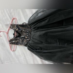 Very puffy black dress never worn 2T